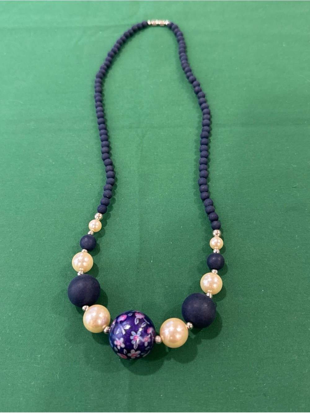 Dk. Blue Beaded Statement Necklace W/Large Central Bead W/Pink&Blue Flowers 103F